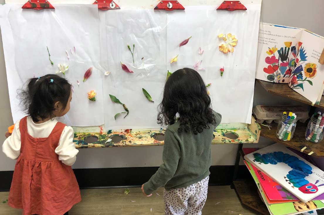 kids making art with mixed media and flowers