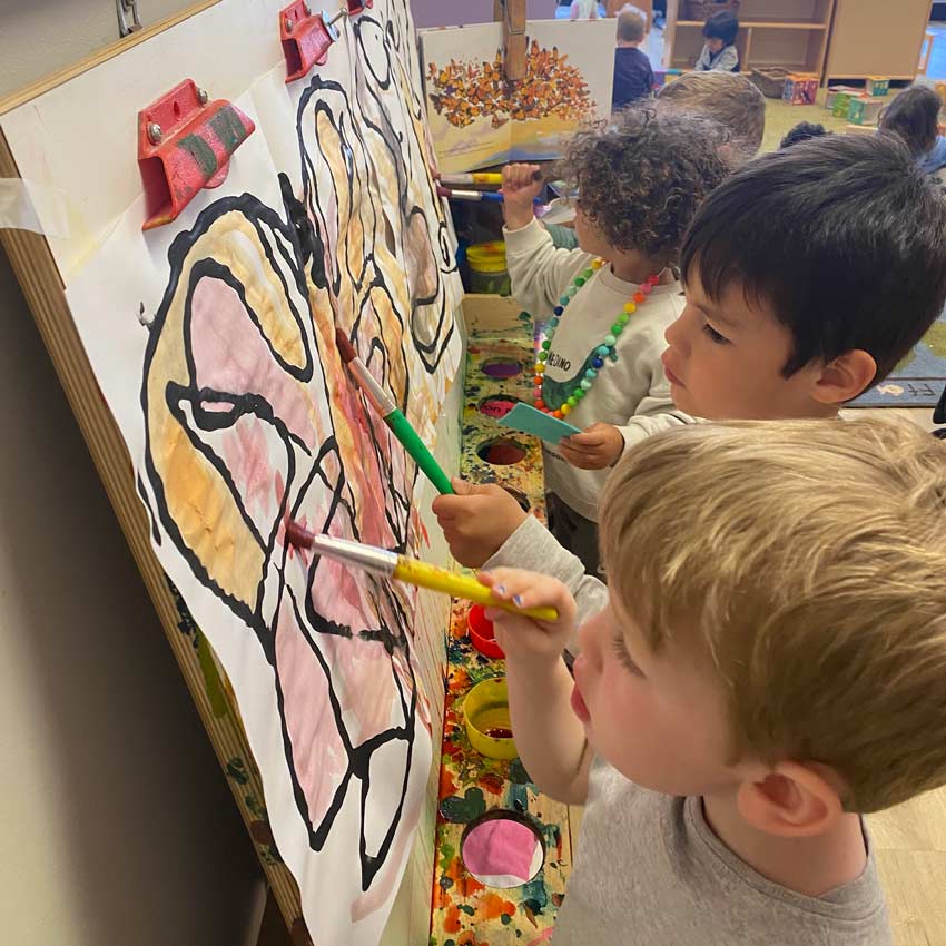 boys painting abstract