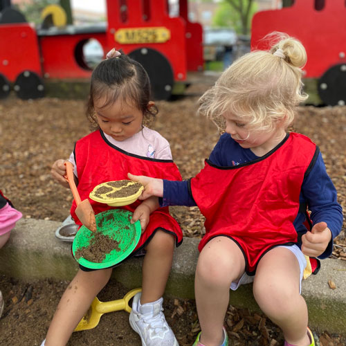 2/3s students playing on playground